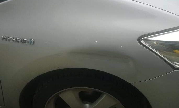 Car Dent Repair in Greater London Before bumper scuff and dent