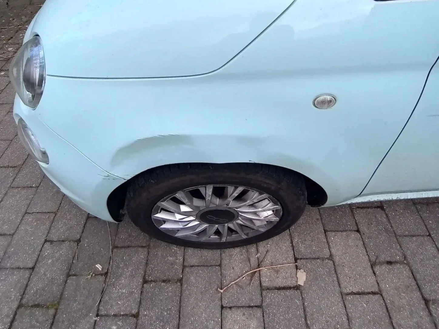 mitsubishi-rear-bumper-dent-repair-before